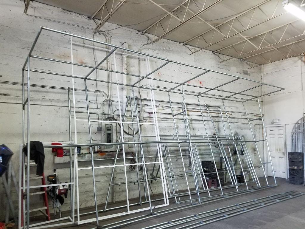 Custom aluminum awning frames being fabricated in the EAB Awnings workshop